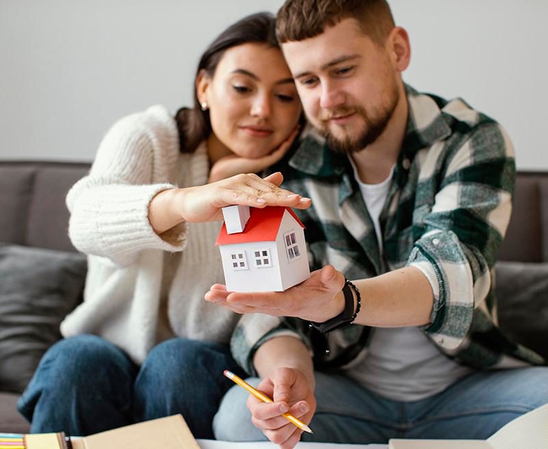 Couple reviewing home insurance