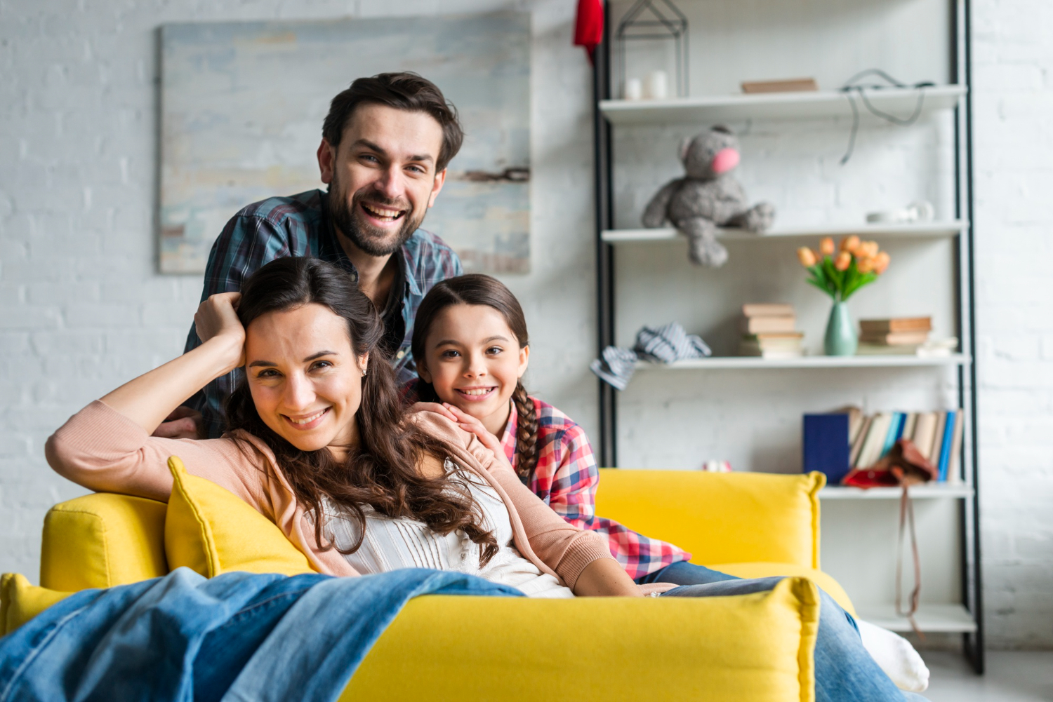 happy-family-sitting-couch-living-room